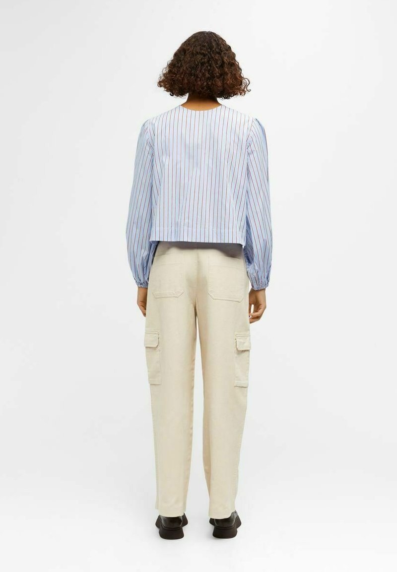 Fashion Inside-out Wear Bow Solid Color Pleating Long Sleeve Top