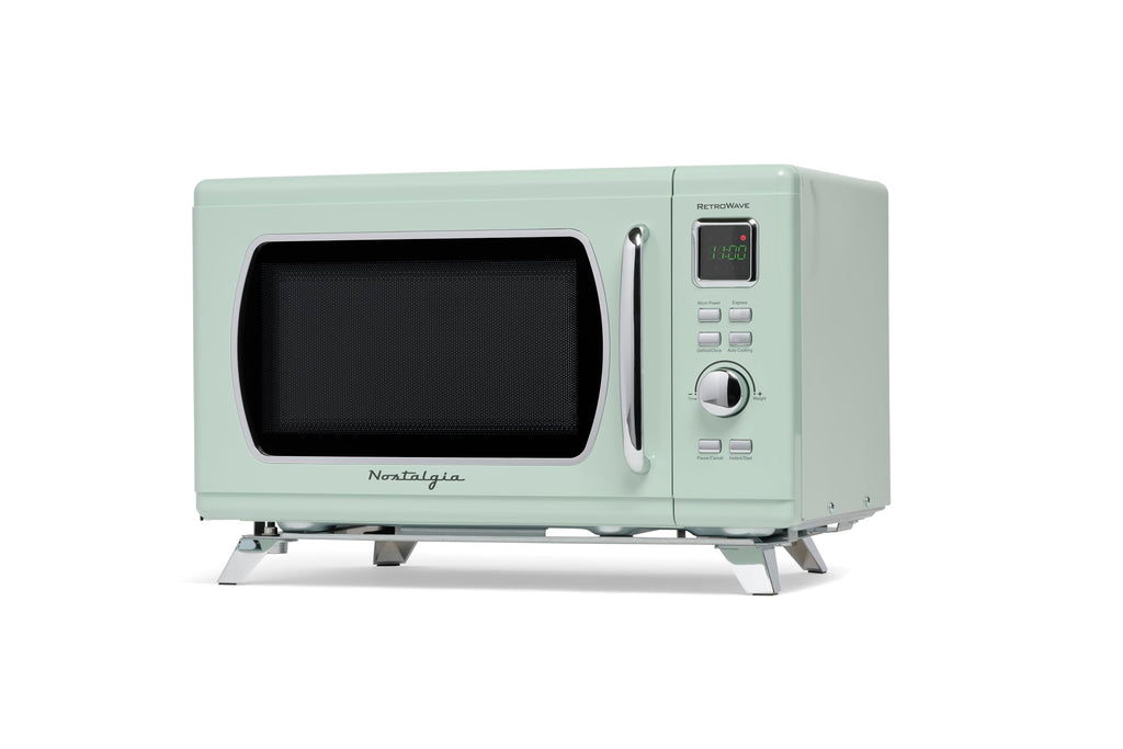 Nostalgia Retro Compact Countertop Microwave Oven 0.7 Cu. Ft. -700-Watts with LED Digital Display-Child Lock-Easy Clean Interior-Pink