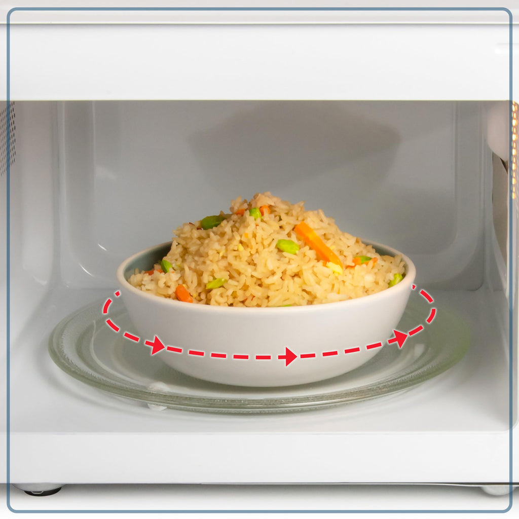 Nostalgia Retro Compact Countertop Microwave Oven 0.7 Cu. Ft. -700-Watts with LED Digital Display-Child Lock-Easy Clean Interior-Pink