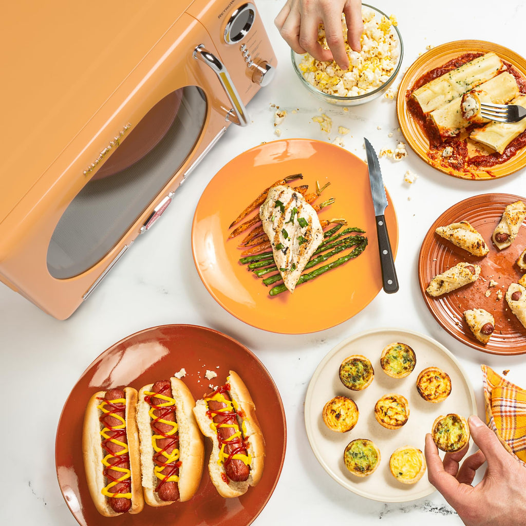 Nostalgia Retro Compact Countertop Microwave Oven 0.7 Cu. Ft. -700-Watts with LED Digital Display-Child Lock-Easy Clean Interior-Pink