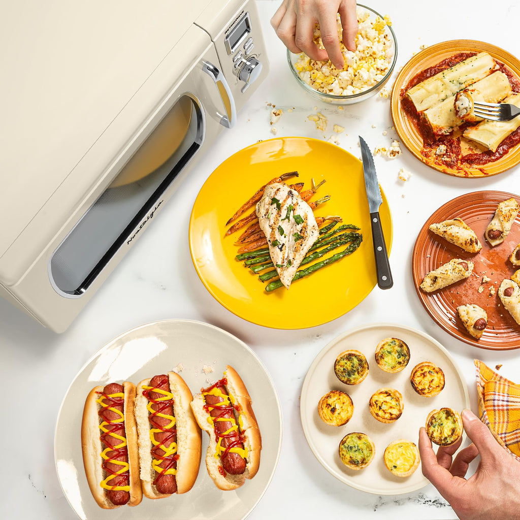 Nostalgia Retro Compact Countertop Microwave Oven 0.7 Cu. Ft. -700-Watts with LED Digital Display-Child Lock-Easy Clean Interior-Pink