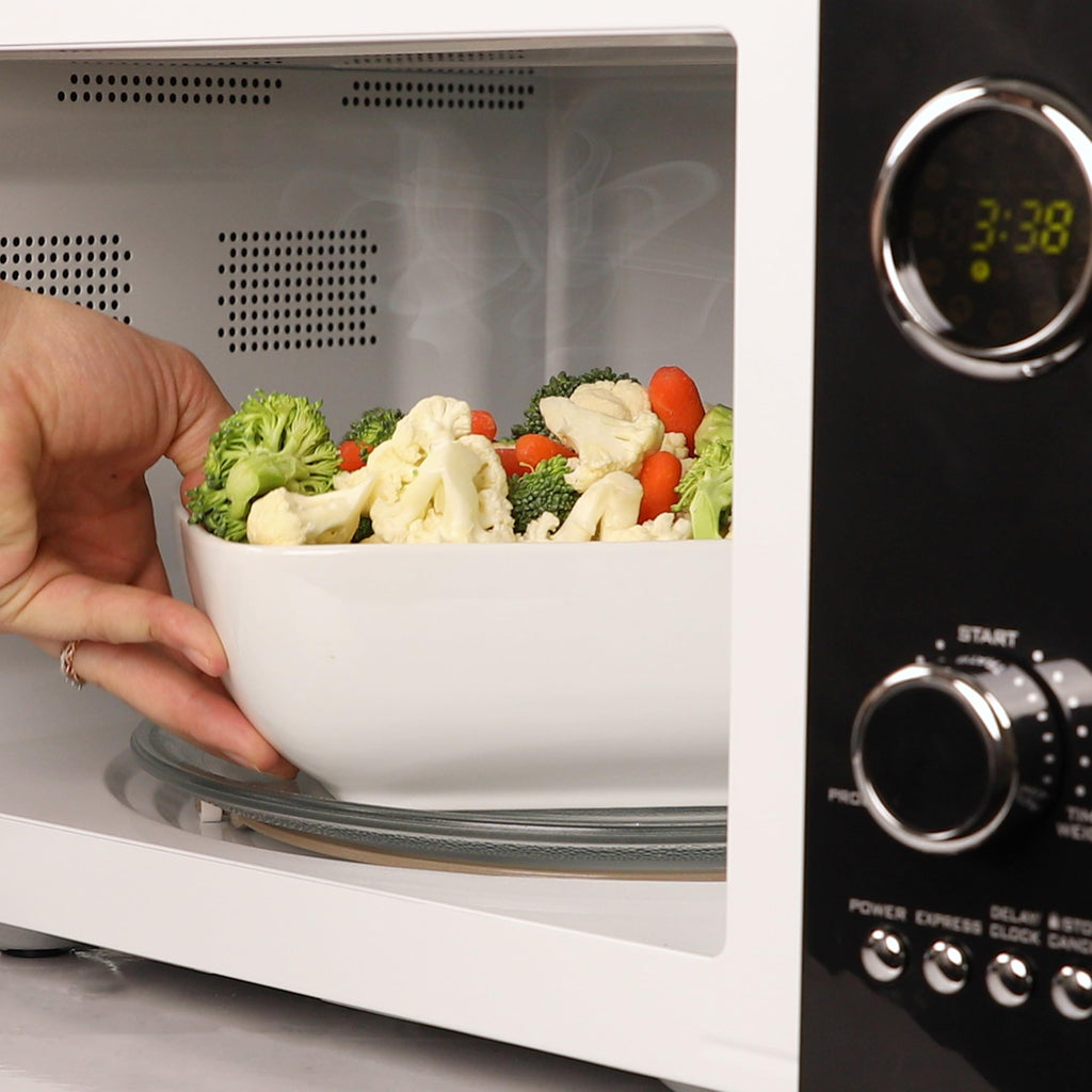 Nostalgia Retro Compact Countertop Microwave Oven 0.7 Cu. Ft. -700-Watts with LED Digital Display-Child Lock-Easy Clean Interior-Pink