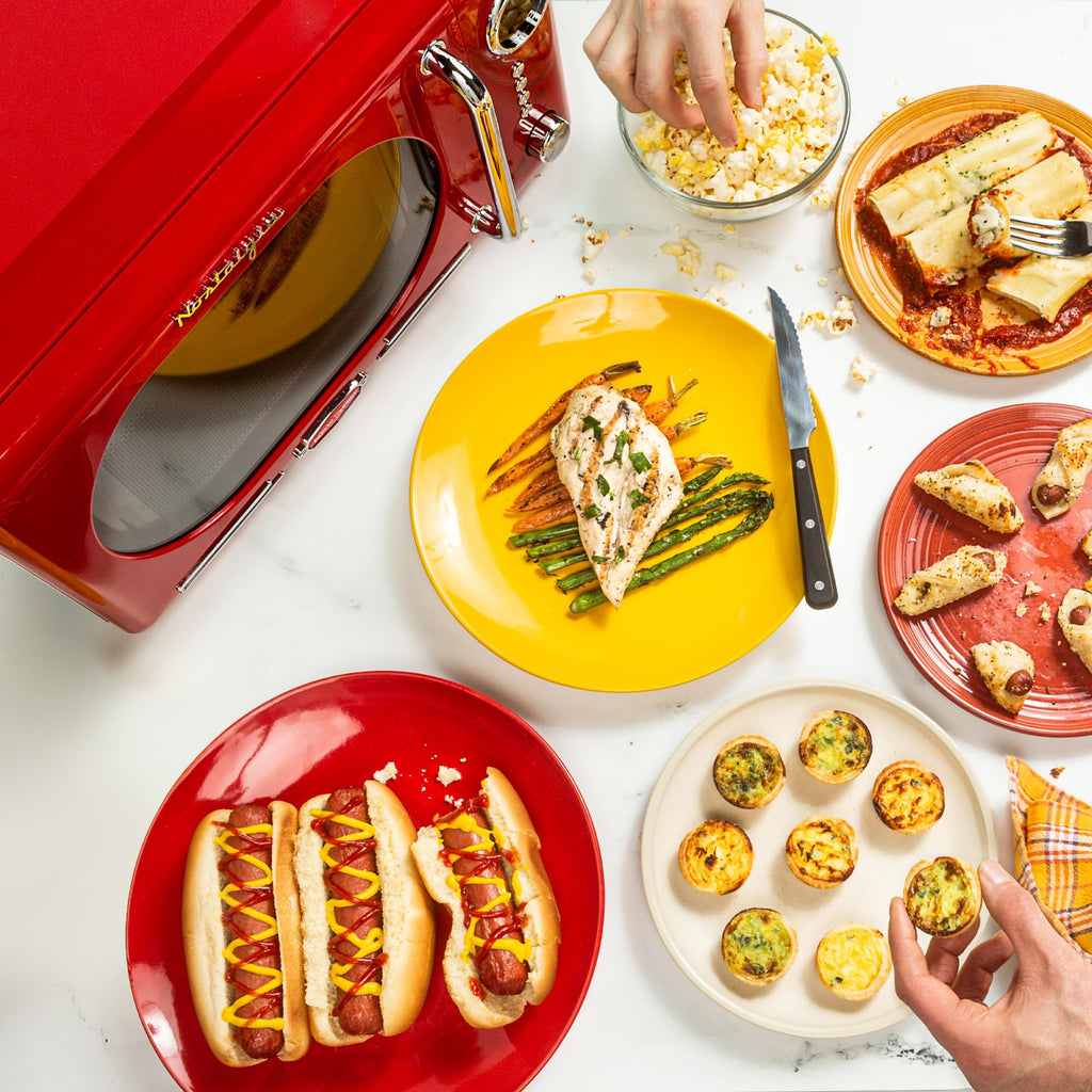 Nostalgia Retro Compact Countertop Microwave Oven 0.7 Cu. Ft. -700-Watts with LED Digital Display-Child Lock-Easy Clean Interior-Pink