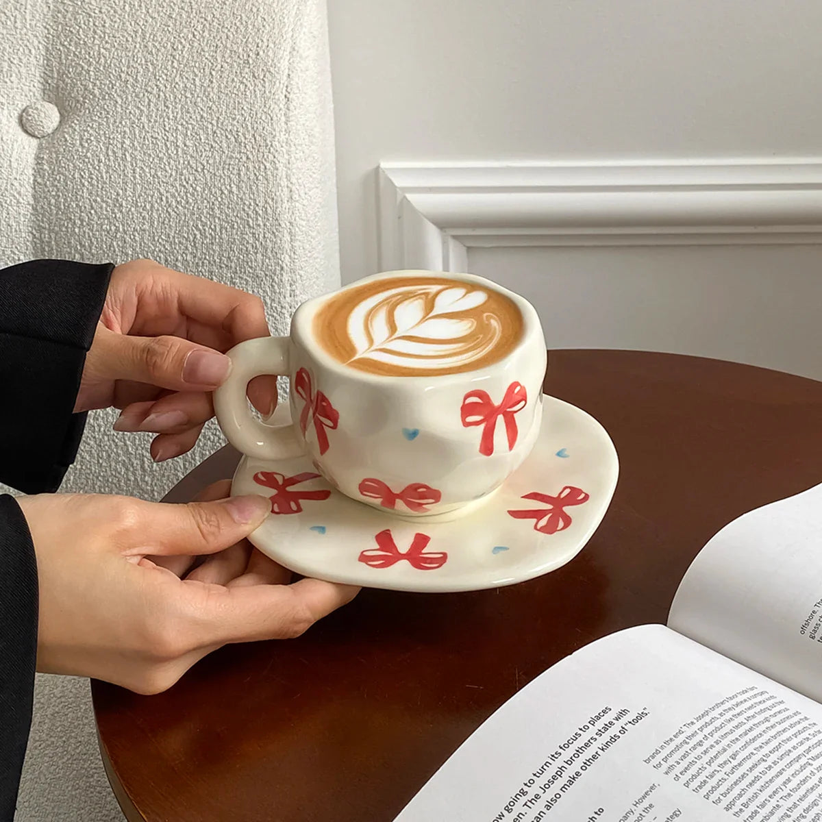 Hand-Kneaded Asymmetrical Bow Tea Cup and Saucer (1 Set)