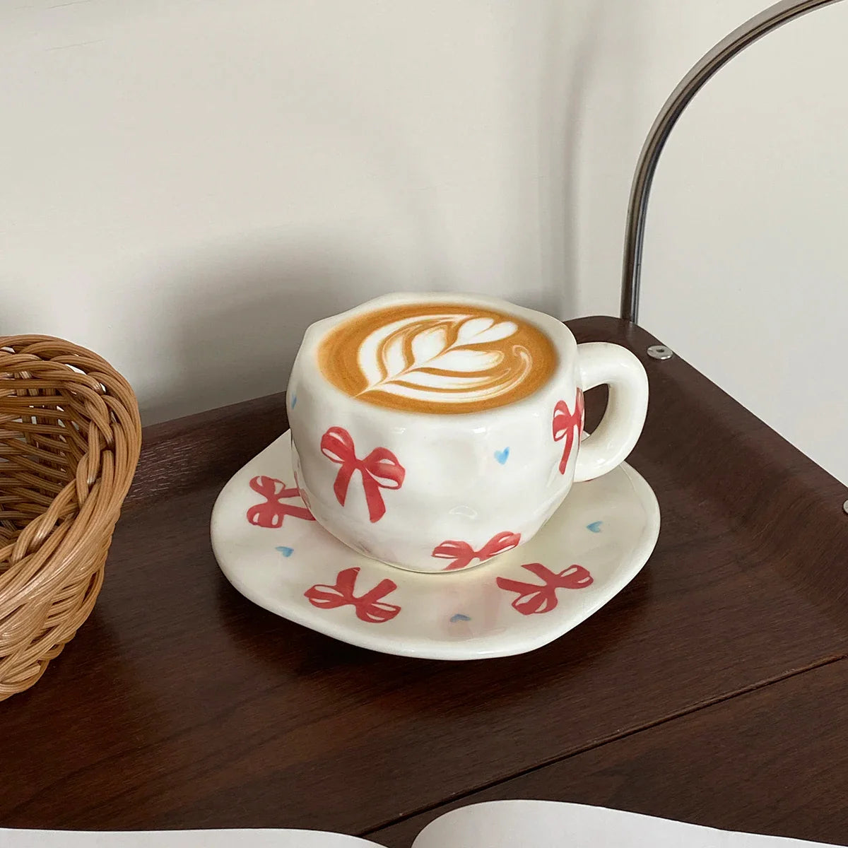 Hand-Kneaded Asymmetrical Bow Tea Cup and Saucer (1 Set)