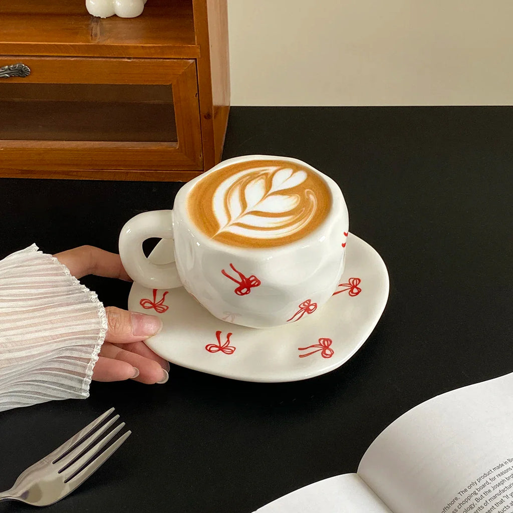 Hand-Kneaded Asymmetrical Bow Tea Cup and Saucer (1 Set)