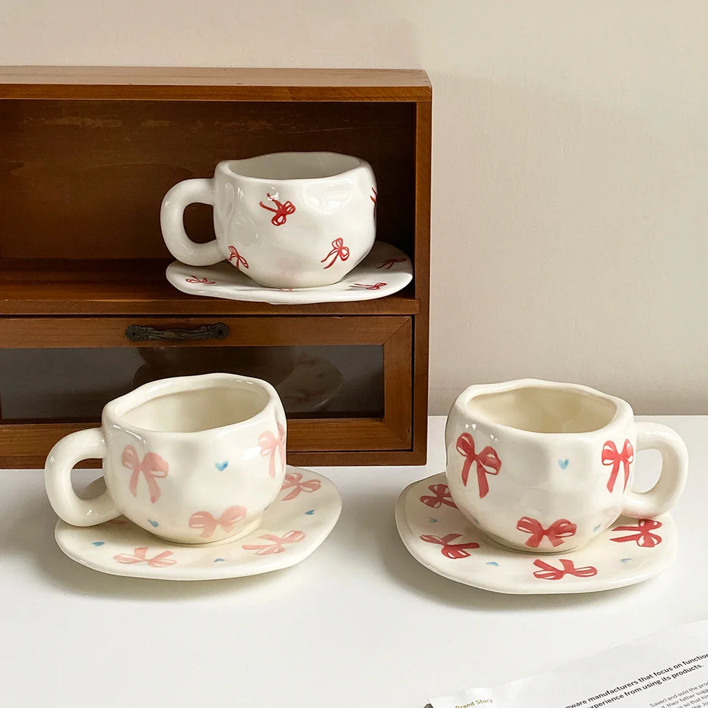 Hand-Kneaded Asymmetrical Bow Tea Cup and Saucer (1 Set)