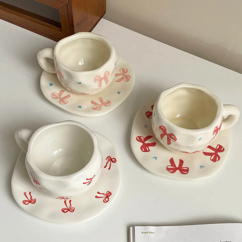 Hand-Kneaded Asymmetrical Bow Tea Cup and Saucer (1 Set)