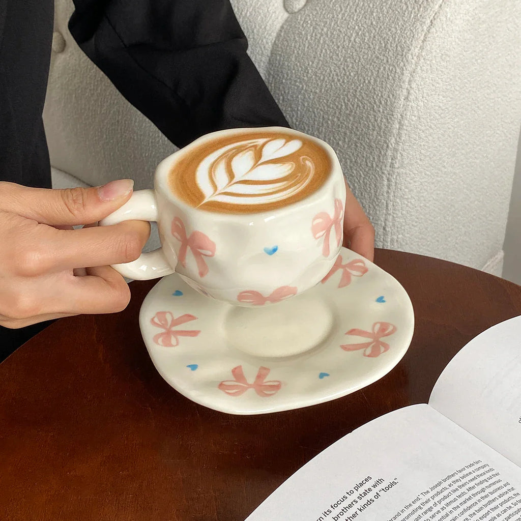 Hand-Kneaded Asymmetrical Bow Tea Cup and Saucer (1 Set)