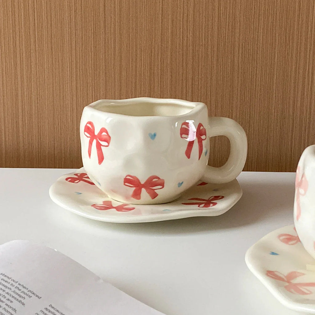 Hand-Kneaded Asymmetrical Bow Tea Cup and Saucer (1 Set)