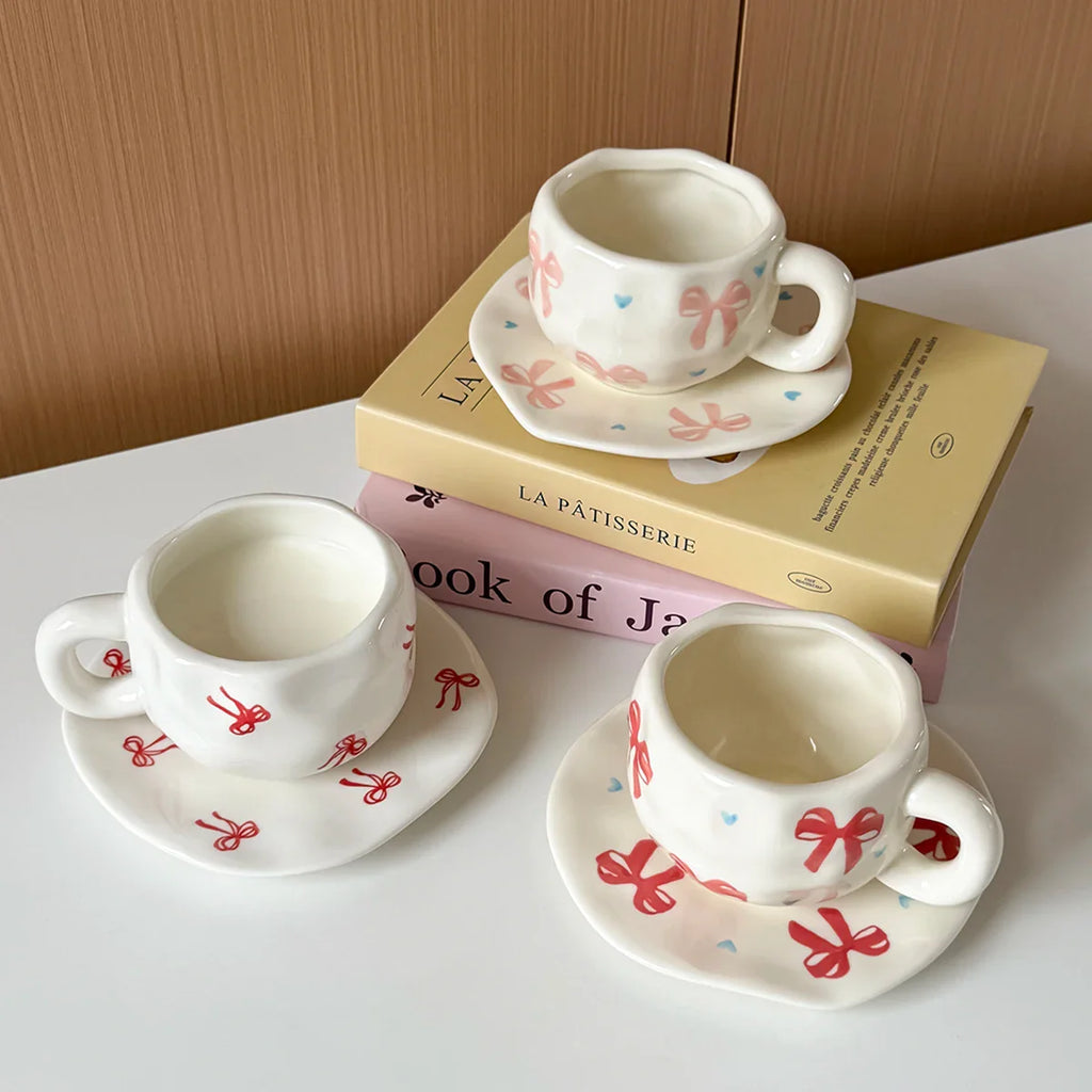 Hand-Kneaded Asymmetrical Bow Tea Cup and Saucer (1 Set)