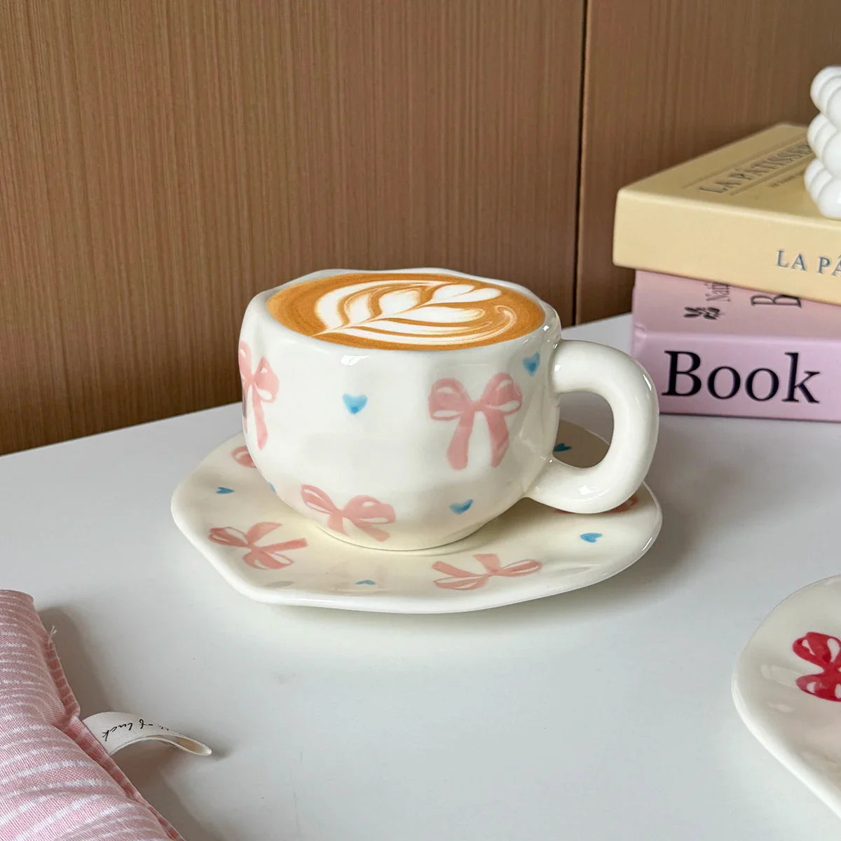 Hand-Kneaded Asymmetrical Bow Tea Cup and Saucer (1 Set)